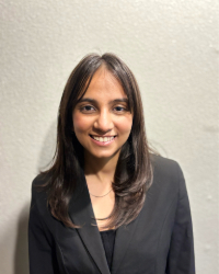 a woman in a black suit